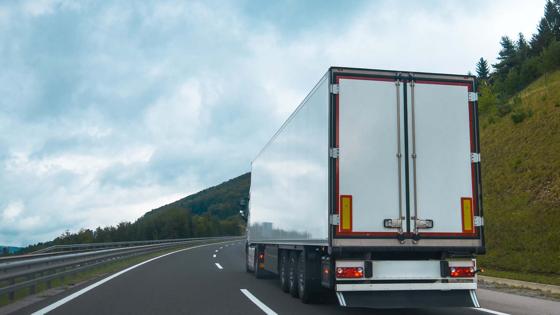 truck driving on mountain road